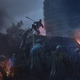 A group of zombies crowd around a van at night while a man on top fights them off.